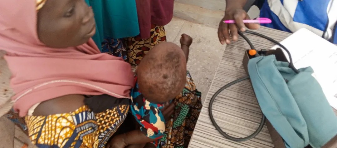 Mothers and children at the medical outreach